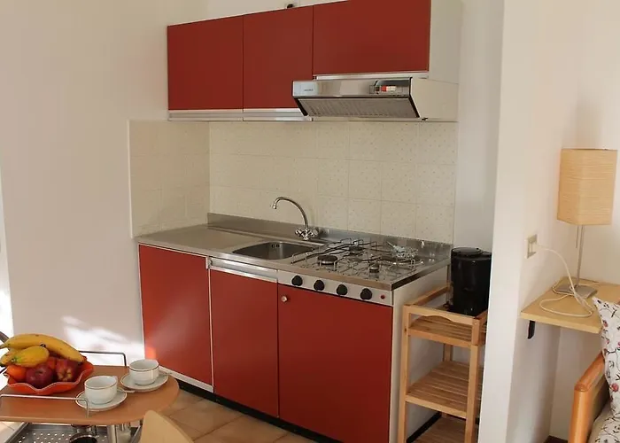 מלון דירות Geranio 4*